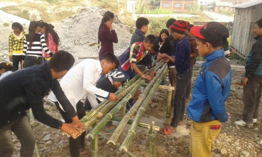 Sunsari Access students helping community to make bamboo benches